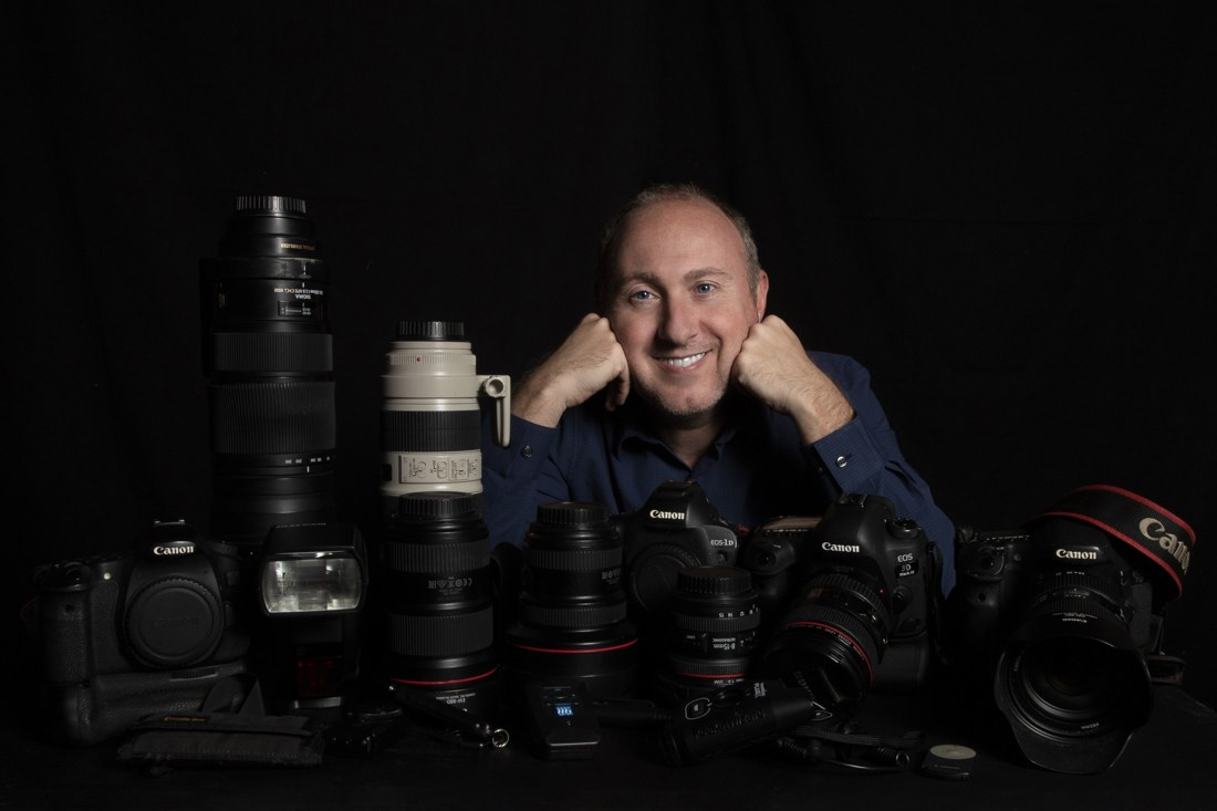 Simone Amaduzzi with his cameras and lenses